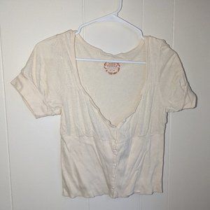 Cream colored V neck Women's M Free People cropped button up short sleeved top